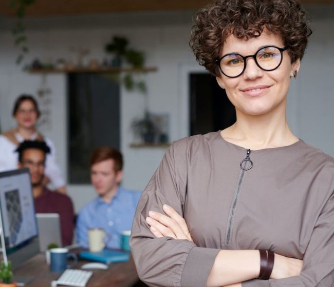 square version freelancer standing in front of her team