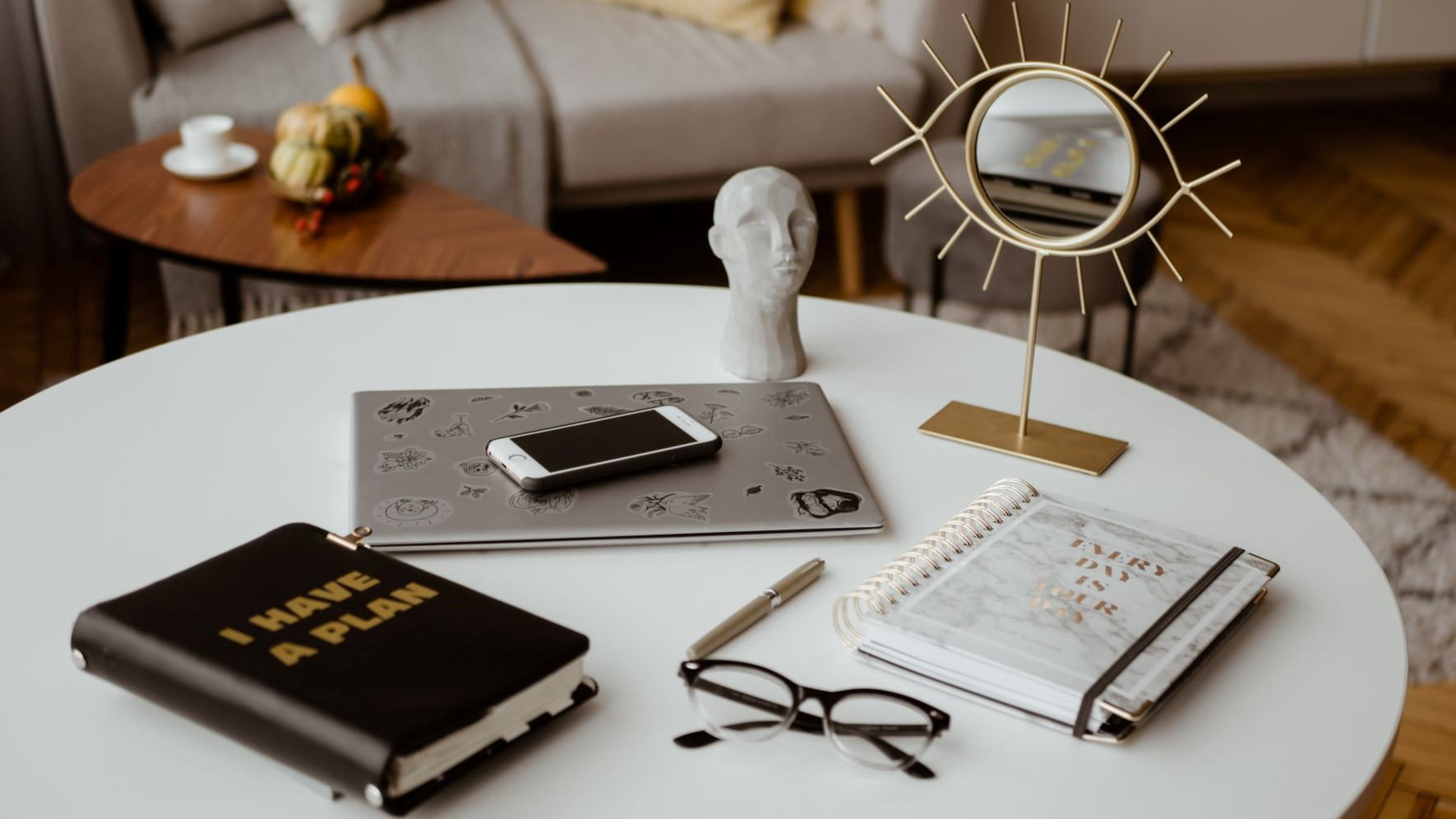 planner on a table with feminine decorations