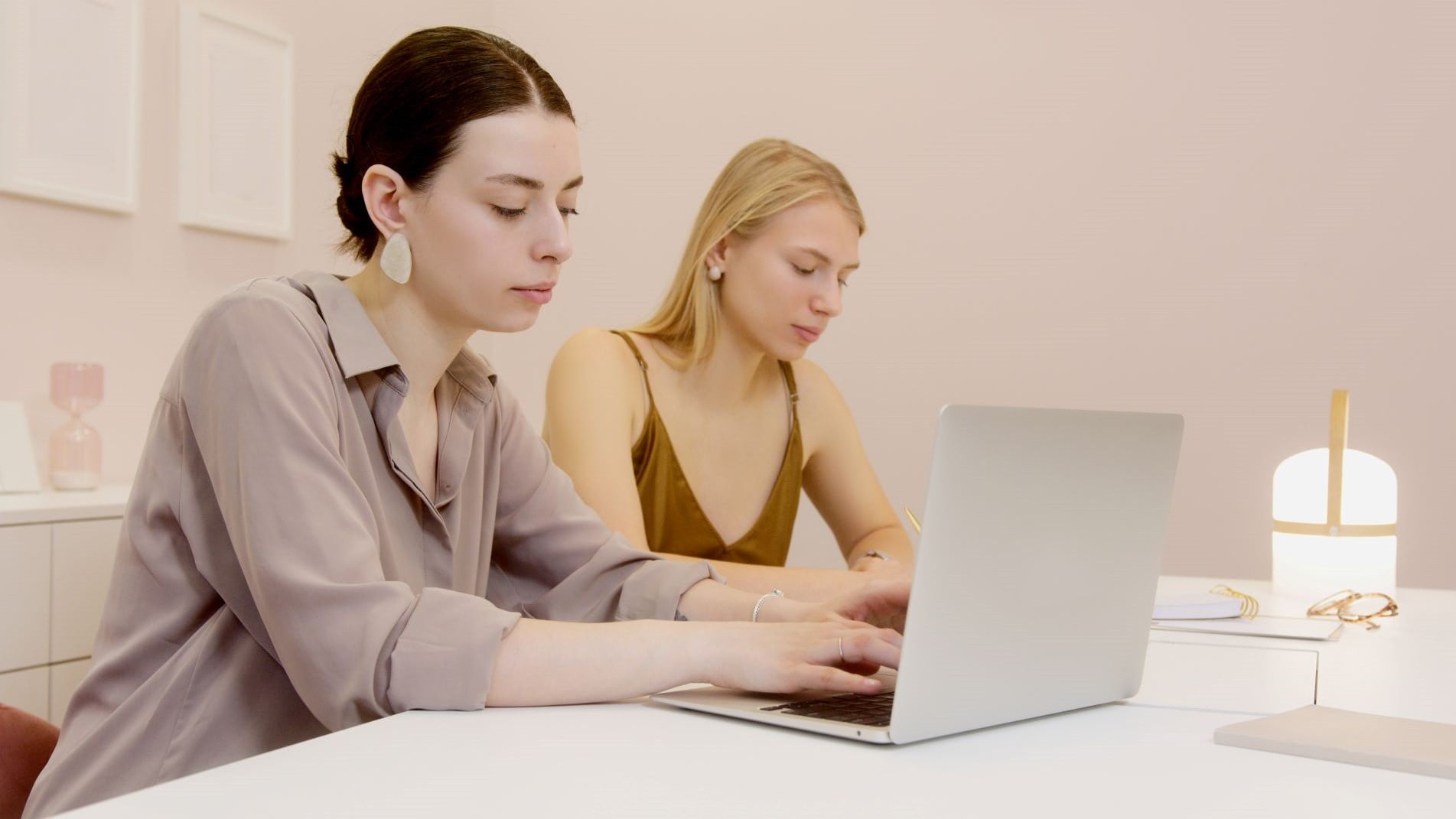 two women freelancers working together