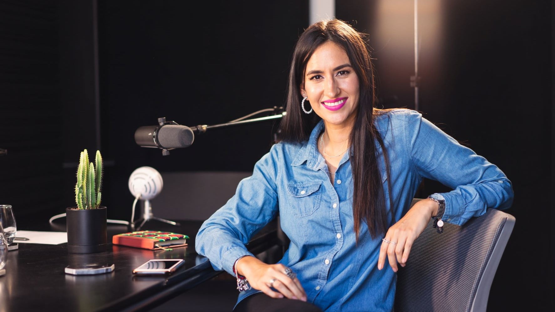 woman recording a graphic design podcast