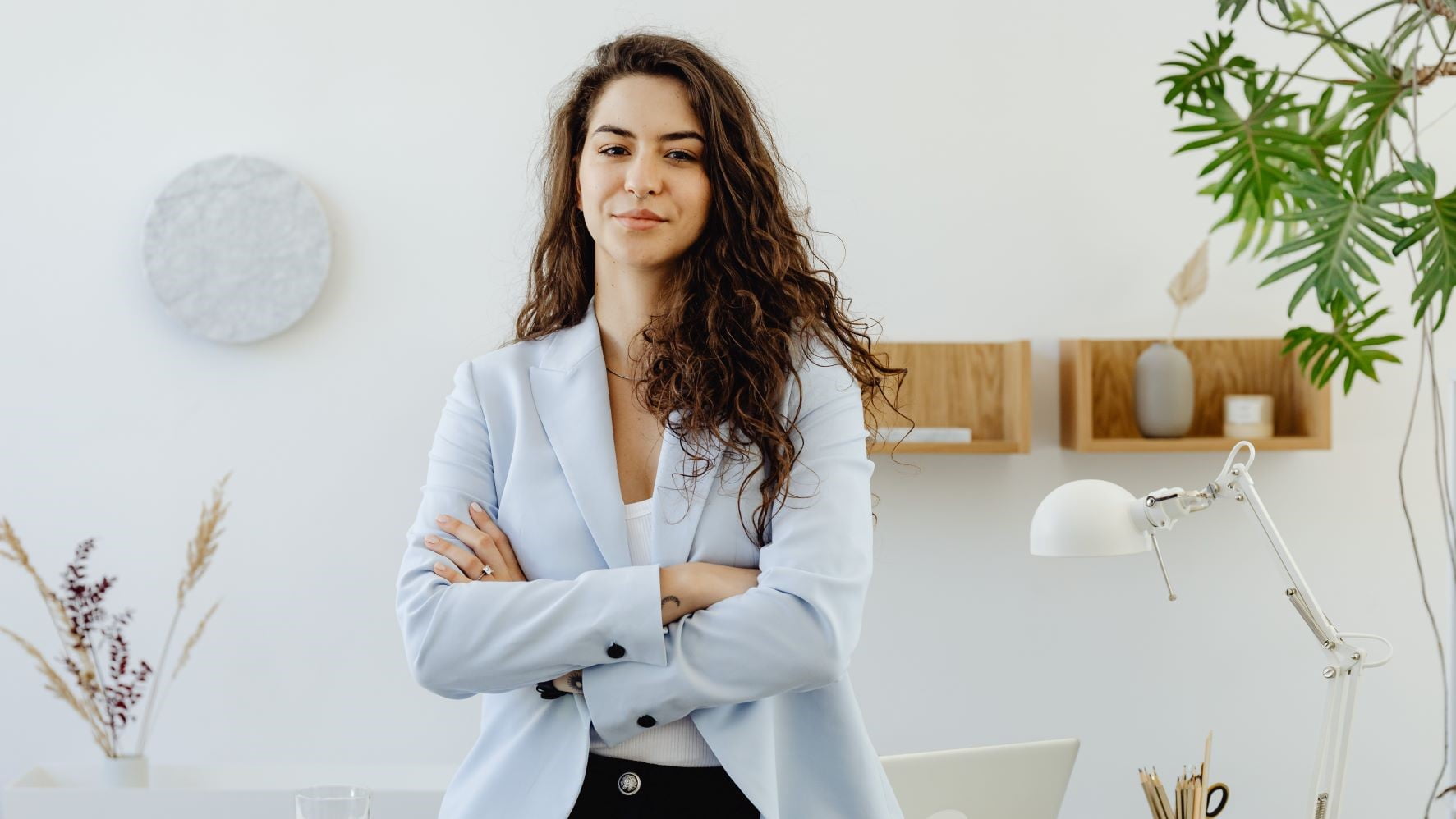 brand designer wearing a blue blazer