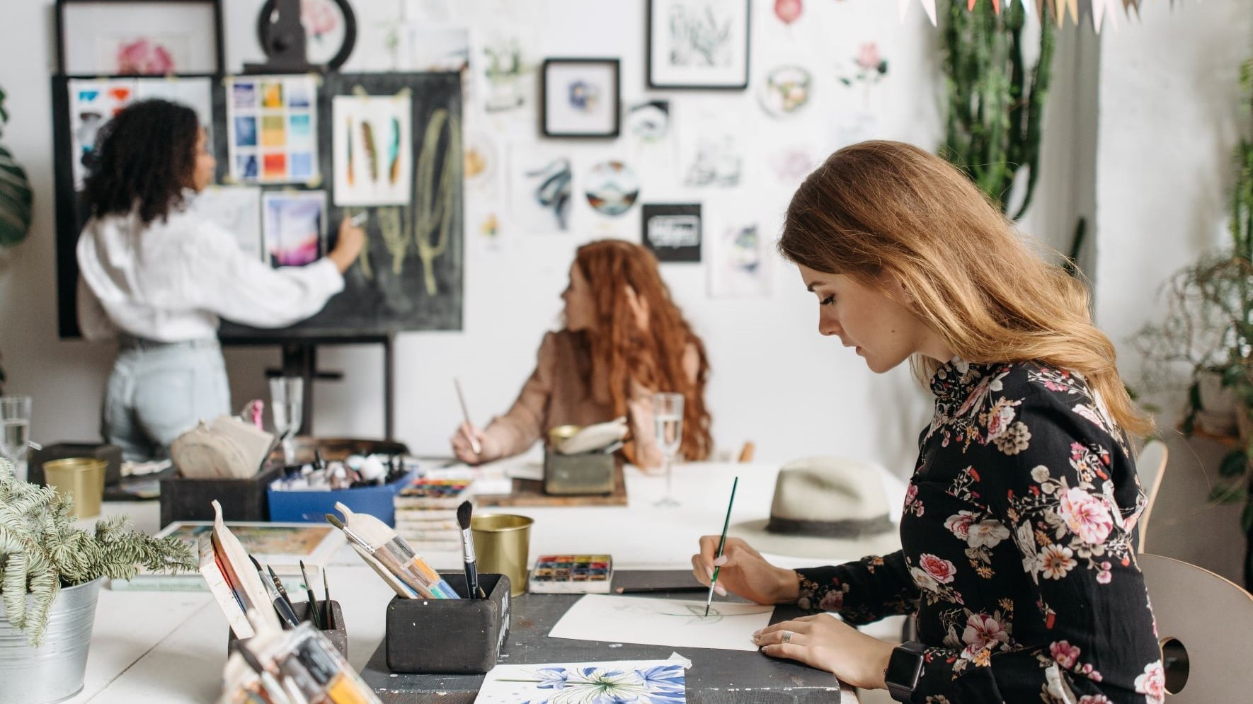 freelance graphic designers working on paintings