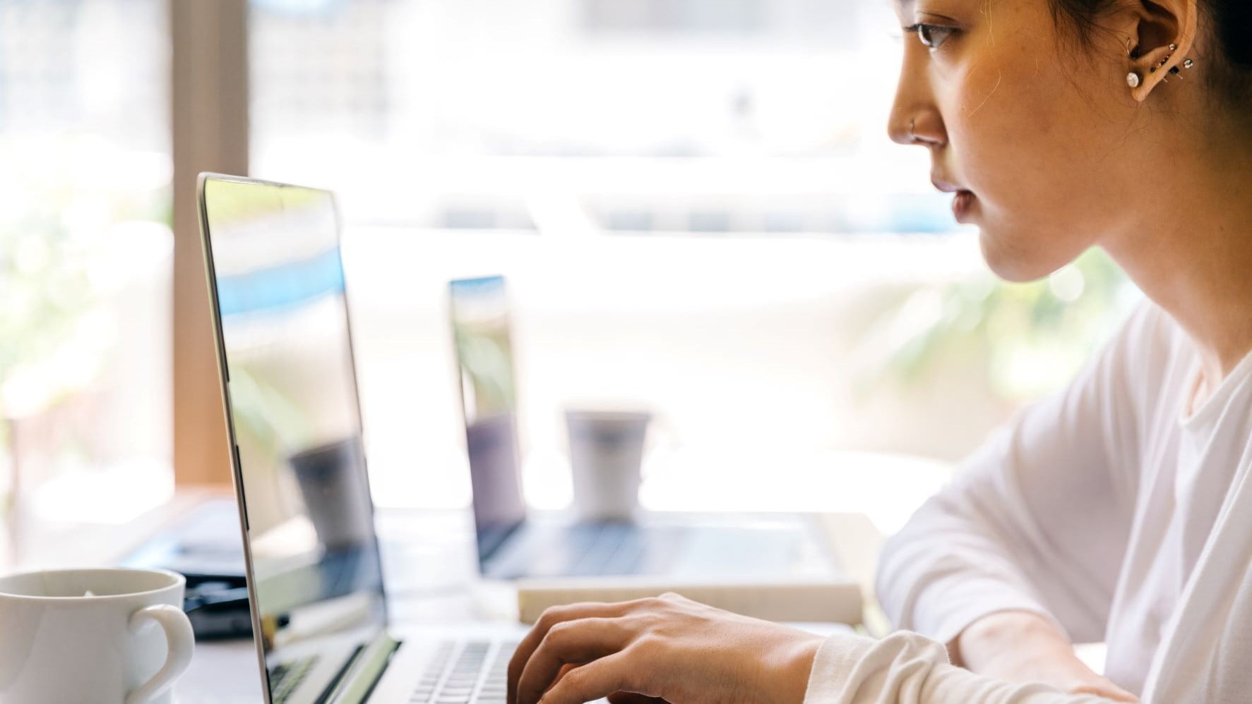 graphic designer working on a laptop