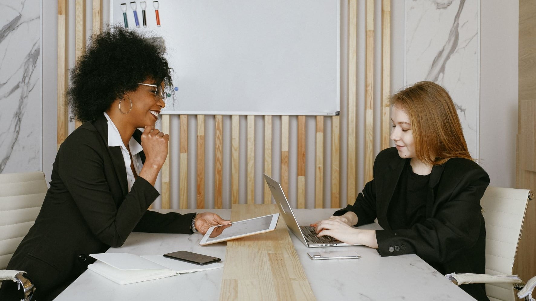 two freelance designers working on a proposal