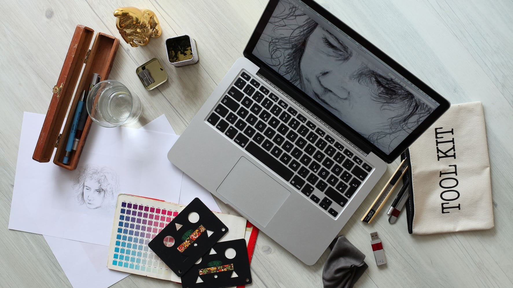freelance graphic design studio laptop and materials