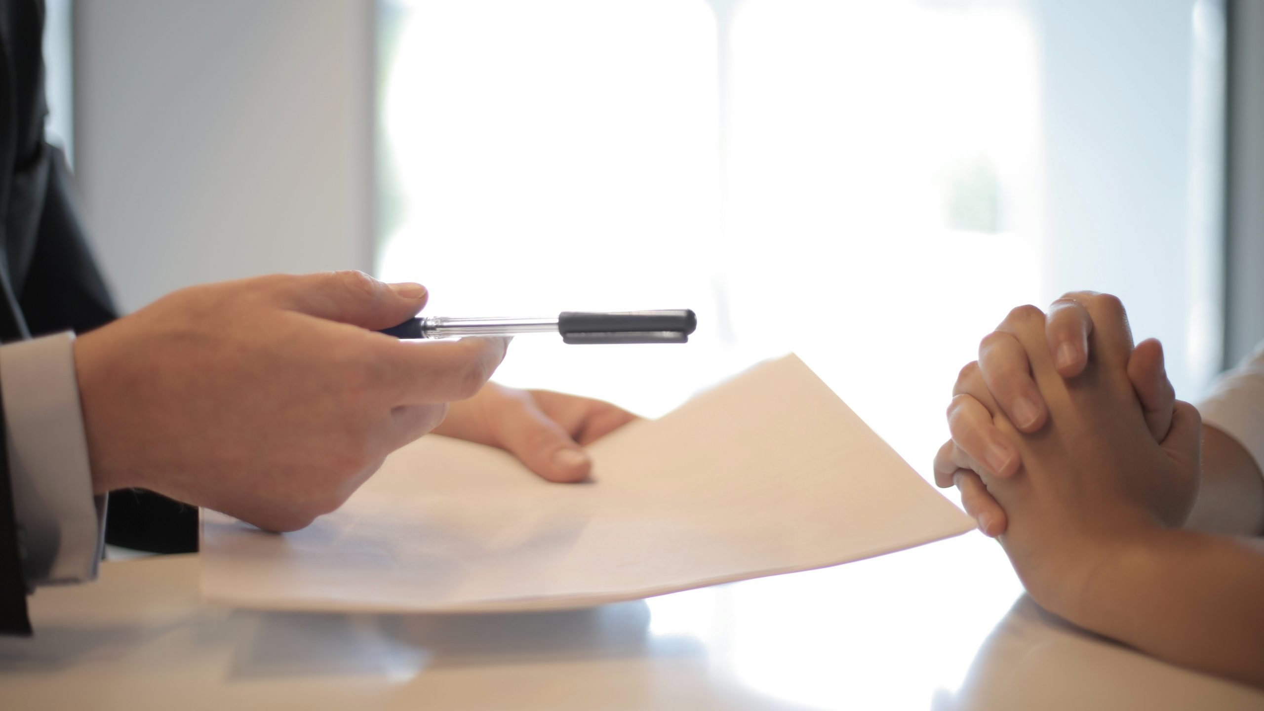 graphic designer giving proposal to client