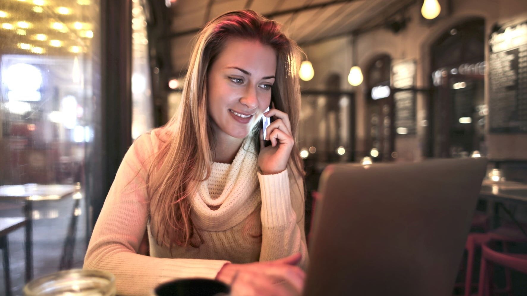 freelance graphic designer in a cafe