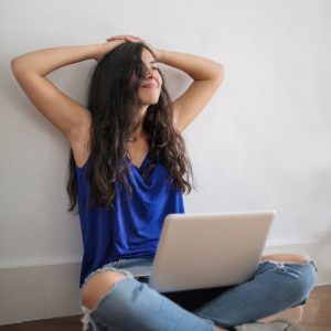 freelance graphic designer sitting with her laptop