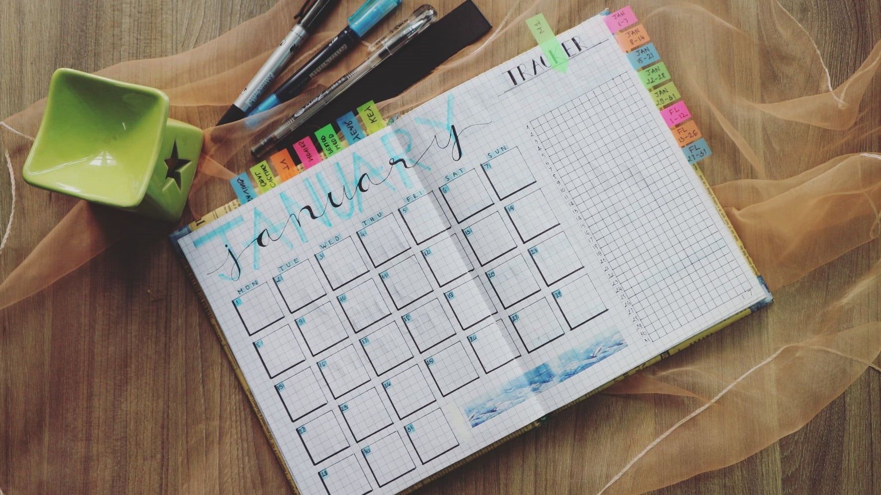 planner with colorful post it notes