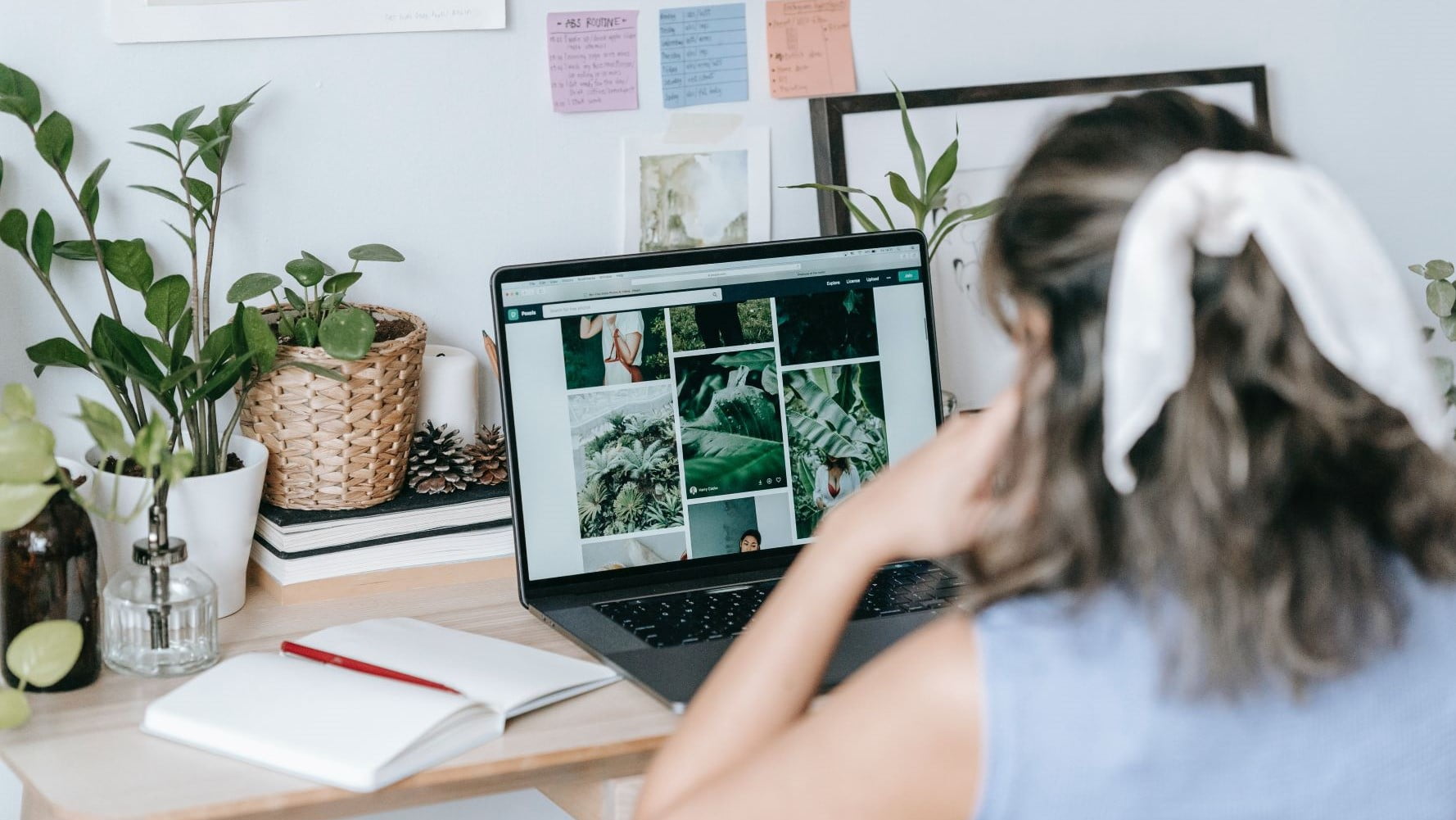 woman working on her freelance graphic design portfolio